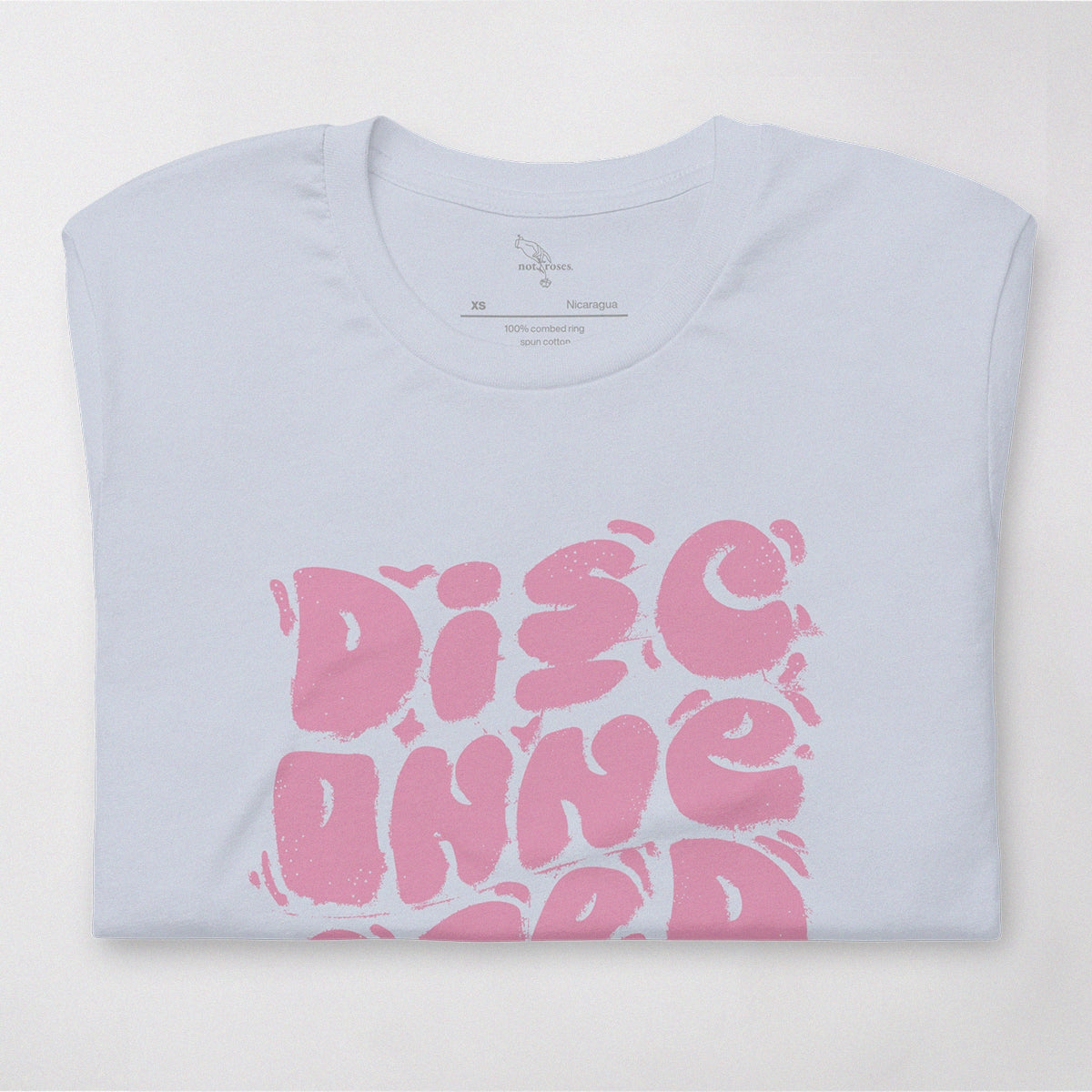 Disconnected (Pink Print) T-shirt. Pale blue folded